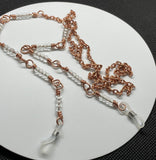 Copper Chain Eyeglass Holder Necklace with Glow in the Dark Czech Glass Beads.  Comes with adjustable rubber ends connectors. 