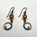 Sparkling Golden Italian Glass Earrings with Twisted Copper Dangles on Niobium Ear Wires.