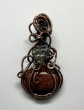 Swirling Goldstone Pumpkin Pendant in Copper with Glass Leaf Accent. Perfect for Fall