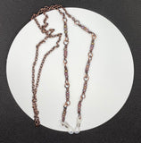 Copper Chain Eyeglass Holder Necklace with Colorful Glass Beads.  Comes with adjustable rubber ends connectors. 