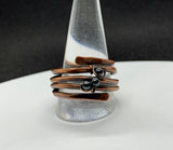 This ring features heavy gauge hammered copper with Hematite Bead accents in the front.