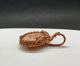 Sparkling Sunstone Pendant in Wire Wrapped Copper with glass bead accents. 