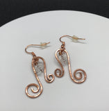 Hammered copper and glass earrings