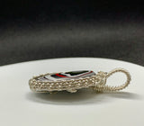 Fordite Pendant in Sterling and Fine Silver
