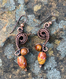 Wire Wrapped Copper Earrings with Picasso Jasper, these have Niobium ear wires. Niobium is naturally hypoallergenic, making this ear wire especially suited for customers with metal sensitivities. 