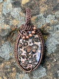 Beautiful spotted Leopard Skin Jasper Pendant wrapped in handwoven copper with copper bead accents.  