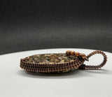 Beautiful spotted Leopard Skin Jasper Pendant wrapped in handwoven copper with copper bead accents.  
