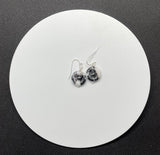 These little Black and White Sterling Silver Earrings are made with an Agate Donut with a glass bead in the middle.