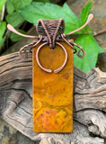 Striking Bold Rectangle Jasper Pendant with hammered copper components and wire wrapped bail.