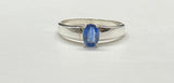 This exquisite ring showcases a faceted Blue Kyanite gemstone, known for its captivating deep blue hues and natural shimmer. Set in a sleek Sterling Silver band, the design highlights the stone's brilliance while offering a timeless elegance. Perfect as a statement piece or for everyday wear, this ring is a must-have for any jewelry enthusiast.