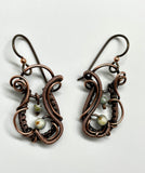 Wire Wrapped Copper Earrings with Czech Glass and a Czech Glass Dangle on Niobium Ear Wires.