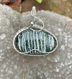 Chrysotile in Serpentile ( also known as Swiss Opal) Pendant in wire wrapped Argentium Silver.