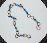 Handmade Copper Ankle Bracelet with Flashy Blue Glass Beads. 