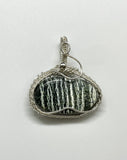 Chrysotile in Serpentile ( also known as Swiss Opal) Pendant in wire wrapped Argentium Silver.