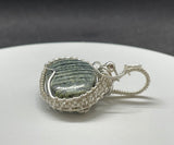 Chrysotile in Serpentile ( also known as Swiss Opal) Pendant in wire wrapped Argentium Silver.