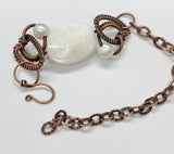 Shiny Mother of Pearl Bracelet with two Pearls and wire wrapped Copper.