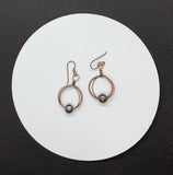 Handmade Copper Hoop Earrings with wire wrapped hoop and Niobium Ear Wires.