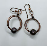 Handmade Copper Hoop Earrings with wire wrapped hoop and Niobium Ear Wires.