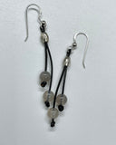 Lightweight Leather Earrings with Gray Agate Dangles with a silver tone accent bead on Sterling Silver Ear Wires.