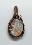 Intriguing Crazy Lace Agate Pendant in Wire Wrapped Copper.