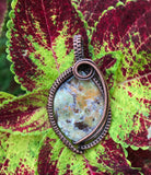 Colorful Frement Jasper Pendant wrapped in handwoven Copper.