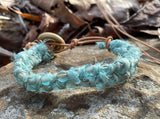 Adjustable Sari Silk Ribbon, Leather and Czech Glass Bead Bracelet in lovely light turquoise colors.