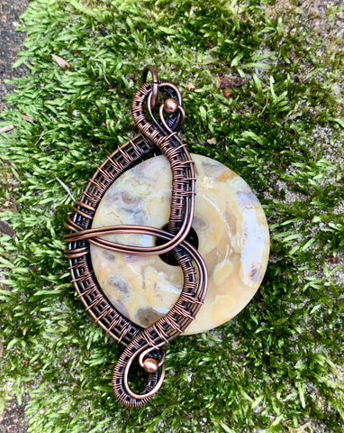 Crazy Lace Agate Donut Pendant wrapped in Copper