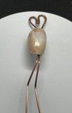 Hammered Copper Olive Shell Hair Stick with a Heart on top. 
