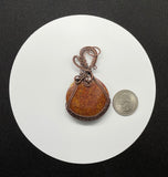 Colorful Round Red Moss Agate Pendant in Wire Wrapped Copper. 
