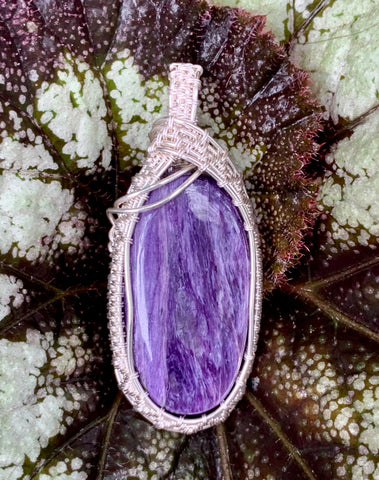 Stunning Charoite Pendant wrapped in hand woven Sterling (.925) and Fine (.999) Silver.