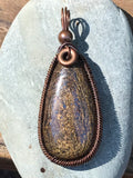 Beautiful Bronzite wire wrapped copper Pendant.