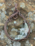 Moss Agate Moon Pendant in Wire Wrapped Copper with an iridescent Glass Star Dangle.