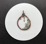 Moss Agate Moon Pendant in Wire Wrapped Copper with an iridescent Glass Star Dangle.
