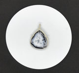 This stunning statement piece features a large Dendritic Opal Pendant wrapped in Sterling Silver.