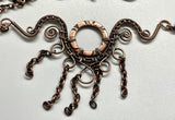 Wire Wrapped Copper Necklace with Embossed Copper Washer, Wire Wrapped Copper and Copper Chain Dangles. 
