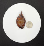 Colorful Striped Agate Pendant in Wire Wrapped Copper. 